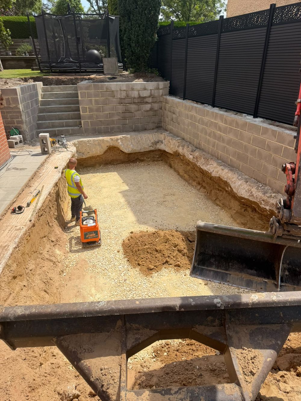 Bulk excavation and foundation dig to formation on a development site