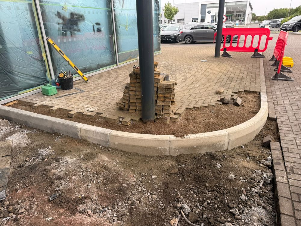 Kerbing, block paving and concrete works to a commercial frontage